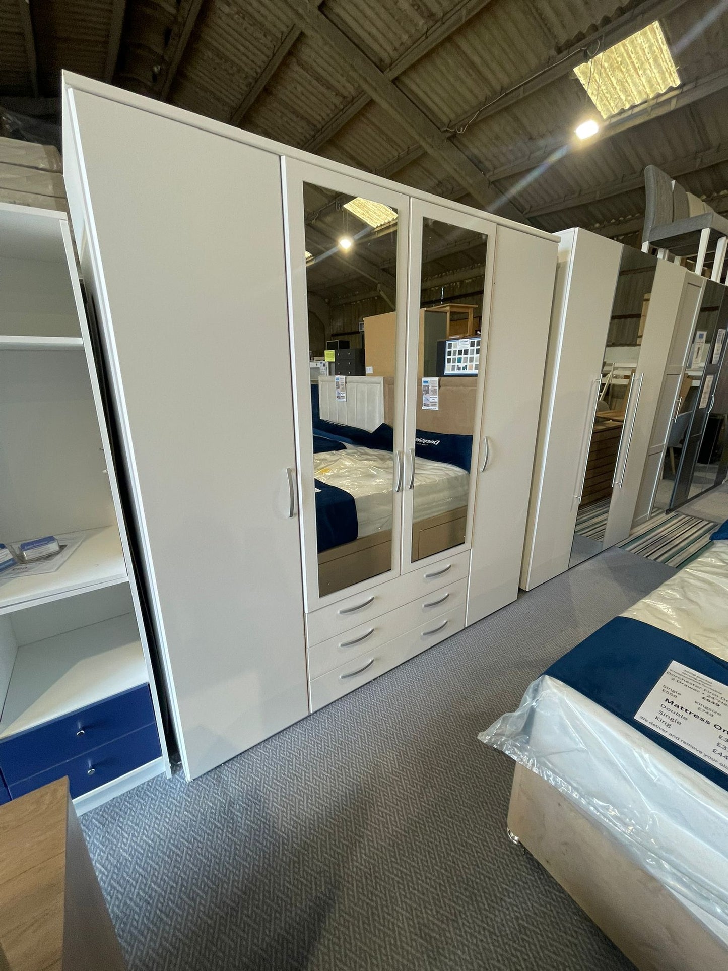 Assembled Hallingford 4 Door 3 Drawer Mirror Wardrobe - White